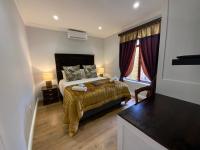 Chambre Lit Queen-Size Deluxe