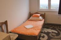 One-Bedroom Apartment with Balcony and City View
