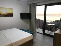 Chambre Double Deluxe avec Balcon - Vue sur Mer
