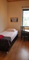 Basic Single Room with Shared Bathroom
