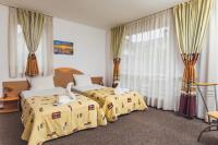 Habitación Doble con balcón (2 adultos + 1 niño)