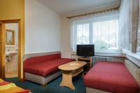 Vierpersoonskamer met Uitzicht op de Tuin.