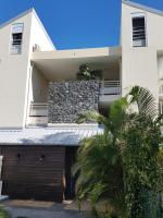 T2 classé 4 étoiles avec jardin, piscine, vue mer à Saint-Gilles-les-Bains - Ferienwohnung