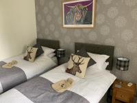 Camera Standard Doppia con Letti Singoli e Vista Giardino