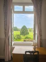 Camera Familiare con Vista Giardino