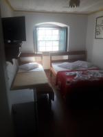 Chambre Triple - Vue sur Ville