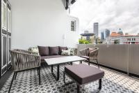 Loft Raffles (con balcón y vista icónica de MBS)