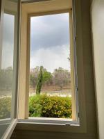 Camera Quadrupla con Vista Giardino 