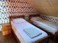 Tweepersoonskamer met 2 Aparte Bedden