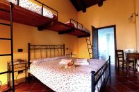 Camera Quadrupla con Balcone e con Vista sui Monti