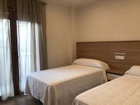 Tweepersoonskamer met 2 Aparte Bedden