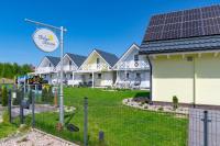 Domki nad morzem Otulone Słońcem - Chambres d’hôtes Rowy