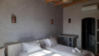 Dreibettzimmer mit Gartenblick