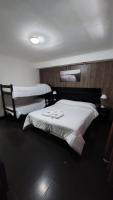 Chambre Triple avec Salle de Bains Privative