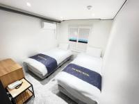 Chambre Lits Jumeaux avec Salle de Bains Privative