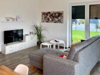 Ferienhaus MOIN. am Harkebrügger See mit Sauna - B&B Barßel