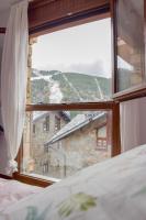 Apartament Ninot Bonito apartamento con vistas a la X de Grandvalira - Chambres d'hôtes El Tarter