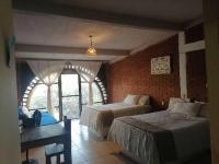 Camera Doppia con Letti Singoli