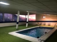 Al lado de Plaza con piscina climatizada - B&B Sierra Nevada