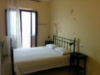 Doppelzimmer mit Balkon und Meerblick