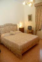 Queen Room with Shared Bathroom
