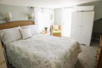 Queen Room with Balcony and Partial Ocean View #304