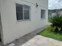 Casa agradável em Camboriú com estacionamento no pátio - Chambres d’hôtes Camboriú
