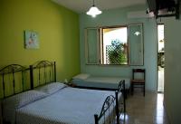 Camera Tripla con Vista Giardino