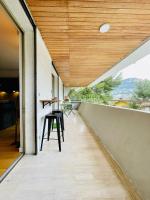 Appart standing avec vue grand balcon - parking - clim - B&B