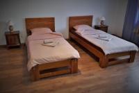 Tweepersoonskamer met 2 Aparte Bedden en een Extra Bed
