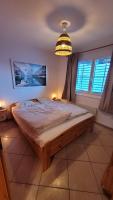 Appartement avec terrasse ensoleillée - Ferienwohnung