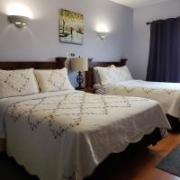 Chambre Double avec 2 Lits Doubles et Kitchenette