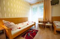 Dreibettzimmer mit Balkon