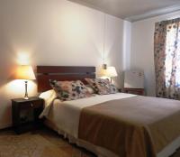 Queen Room with Shared Bathroom