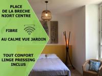 Le Beach centre la Brèche wifi vue jardin - B&B