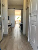 Marina MANZANA, Appartement neuf, vue mer exceptionnelle - LUXE - Chambres d'hôtes Saint-François