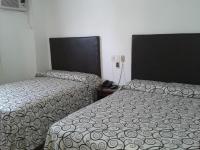 Quarto Duplo com 2 Camas de Casal