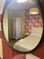 Camera Standard Doppia con Letti Singoli con Bagno in Comune