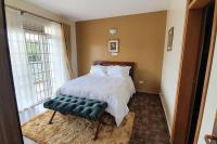 Charming 2-Bed Apartment in Kigo - B&B