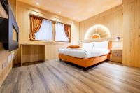 Camera Deluxe (2 Adulti + 1 Bambino)