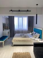 Комфортная студия в Золотом квадрате гАлматы - B&B Almaty