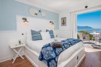 Kamer met Queensize Bed en Uitzicht op Zee