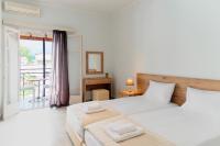 Tweepersoonskamer met 2 Aparte Bedden ent Uitzicht op het Zwembad