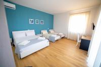 Chambre Deluxe (2 Adultes + 1 Enfant)
