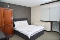Chambre Double Deluxe (2 Adultes + 1 Enfant)