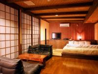 Habitación Superior con zona de tatami y baño al aire libre