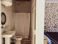 Camera Quadrupla con Vista Giardino 