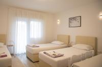 Dreibettzimmer mit Balkon