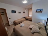 Chambre Quadruple avec Salle de Bains Privative