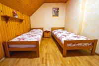 Camera Doppia con Letti Singoli e Bagno in Comune